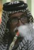 2009-08-06T184241Z_01_ACAE5751FZZ00_RTROPTP_2_OEGEN-IQ-SMOKING-AS6.jpg