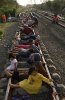 bvillagers_in_indonesia_have_resorted_to_lying_on_train_t_15.jpg